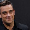 Robbie Williams fait une surprise à une fan !